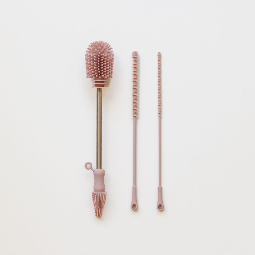An image of the Haakaa Silicone Cleaning Brush Kit, featuring three brushes on a white surface.