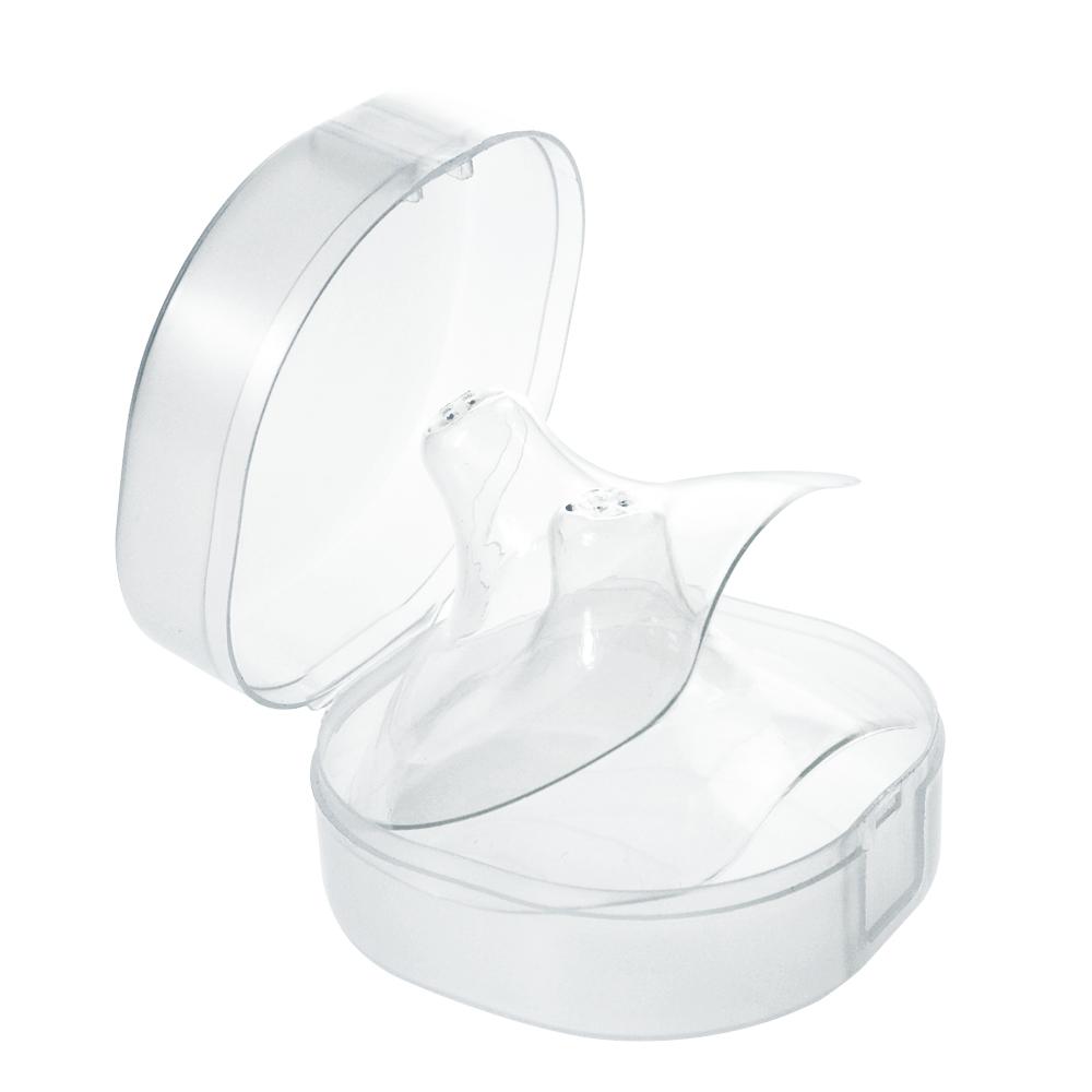 A Haakaa Silicone Nipple Shields container with a lid on it.