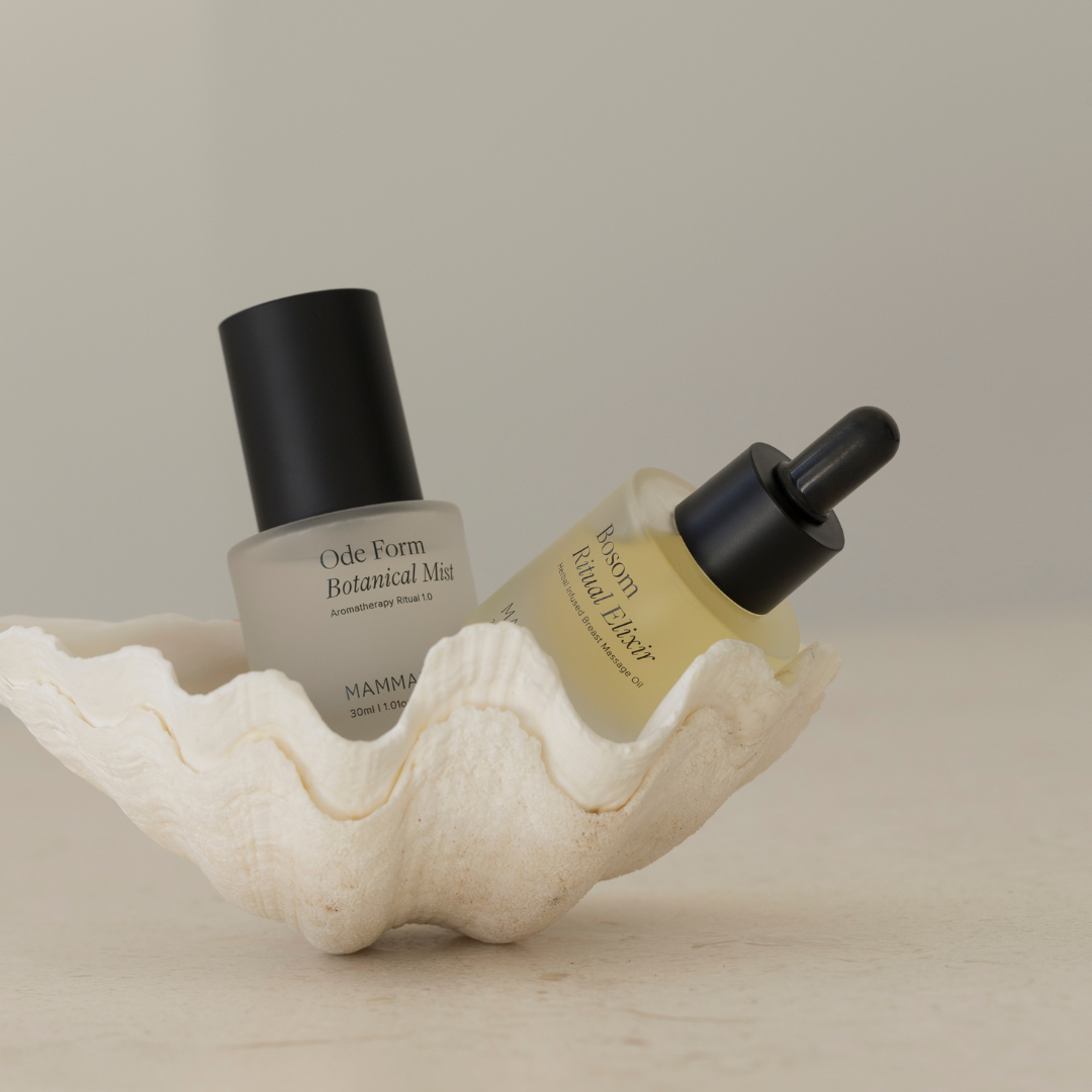 The Mammae EXCLUSIVE mini ritual duo bundle is introduced in a shell on a table.