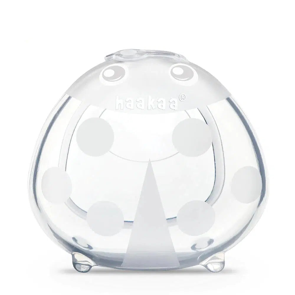 A Haakaa Ladybug Silicone Breast Milk Collector holder on a white background.