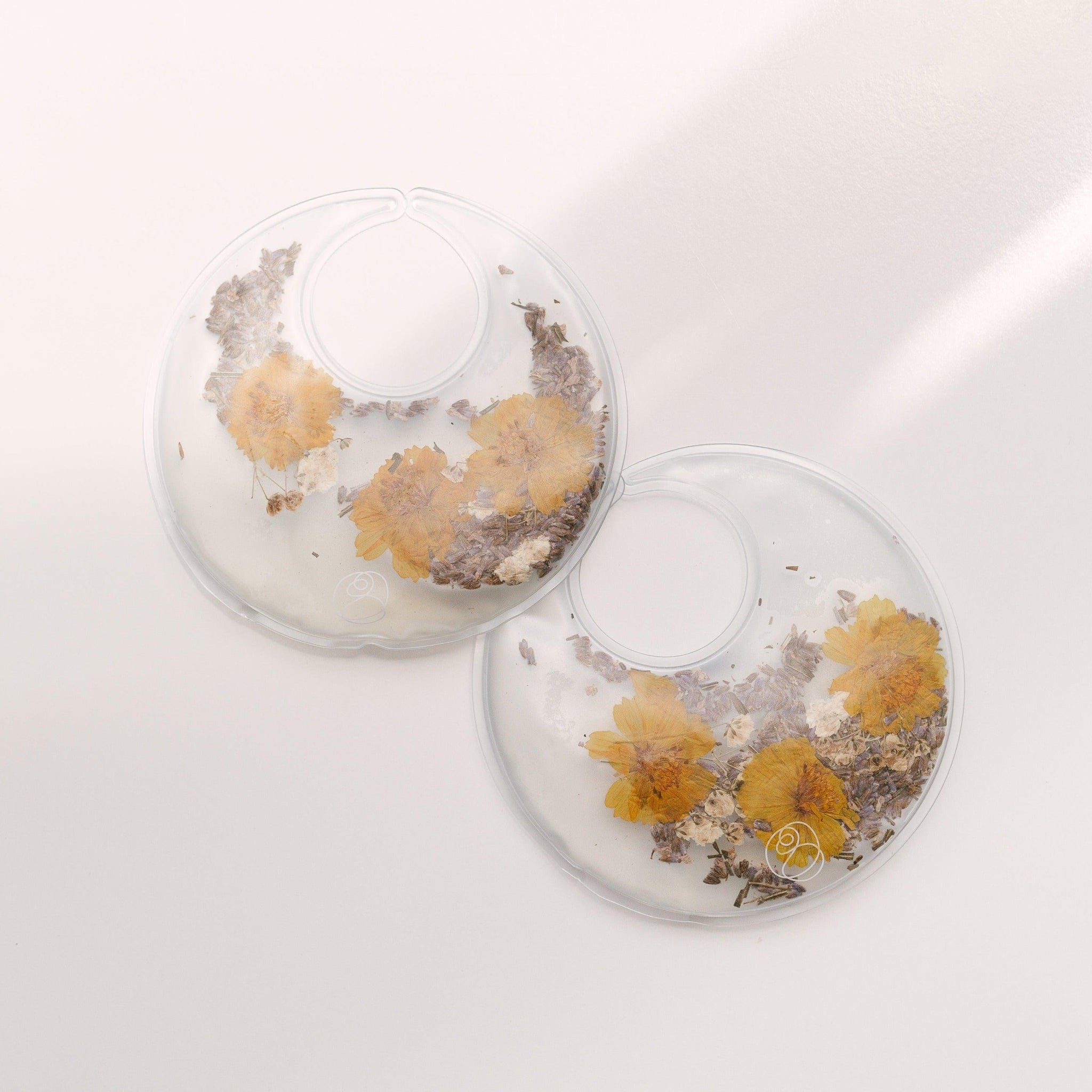 Bare Mum Breast Recovery Earrings adorned with dried flowers, perfect for breastfeeding mothers.