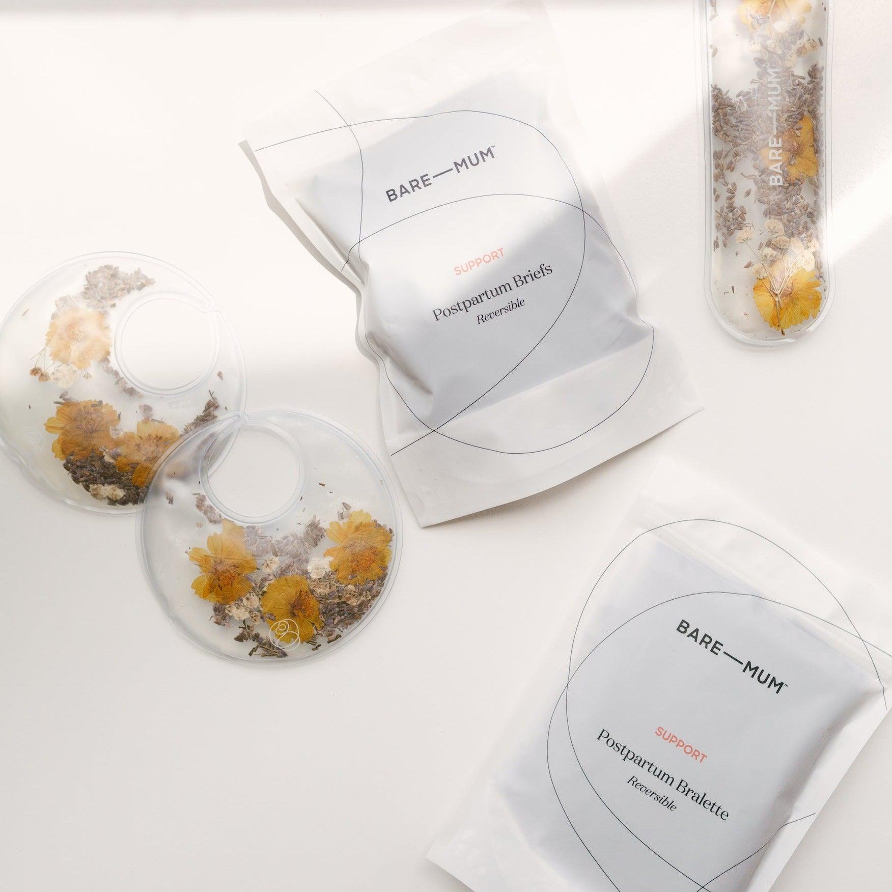 A bag of Bare Mum dried flowers and a packet of Bare Mum powder designed for postpartum recovery and breastfeeding.