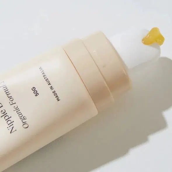 A tube of the Bare Mum Nipple Cream on a white surface.