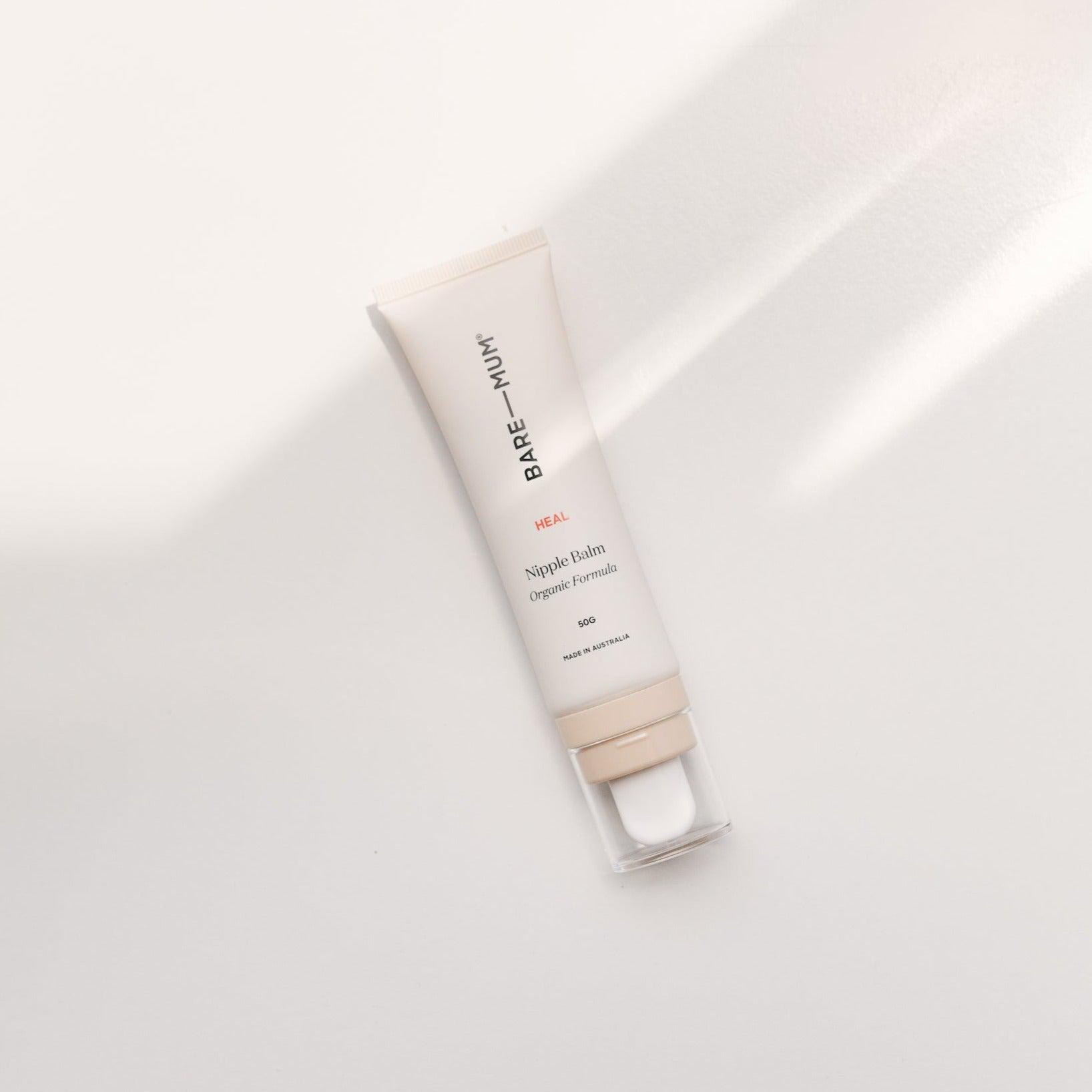 A tube of Bare Mum's Nipple Balm on a white surface for postpartum recovery.