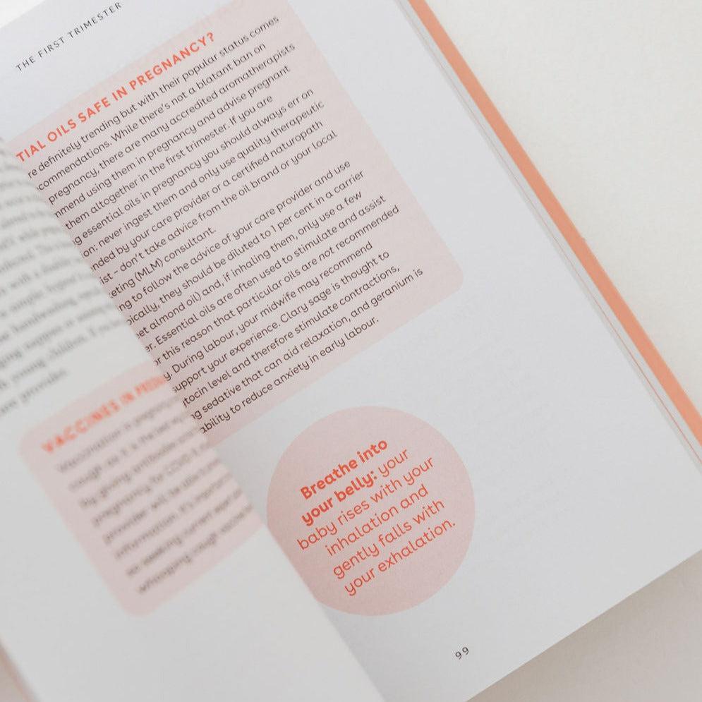 An open book with a pink circle on it about the mother's journey of birth and recovery in The Complete Australian Guide to Pregnancy & Birth.