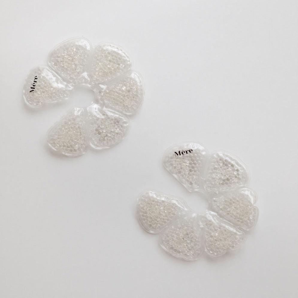 Mère Breast Ice Packs on a white surface.
