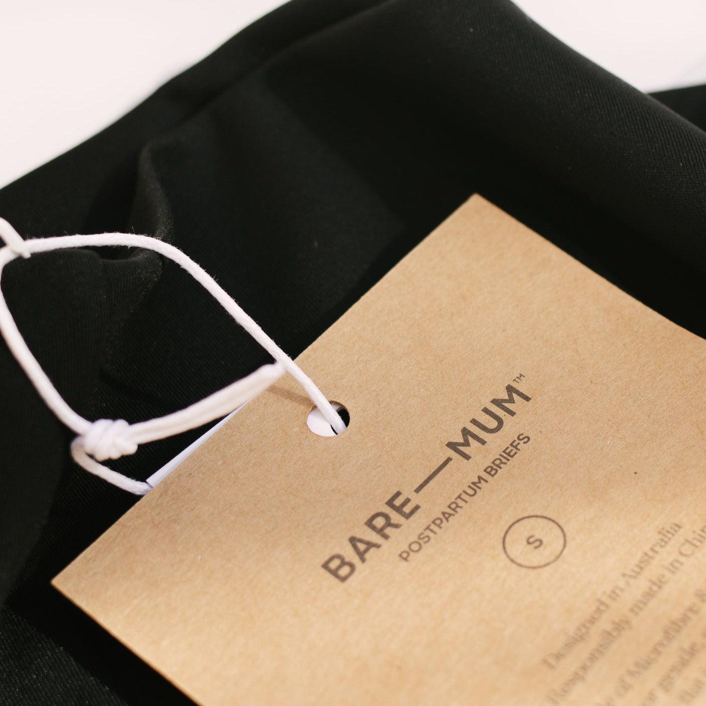 Postpartum black briefs with Bare Mum label.