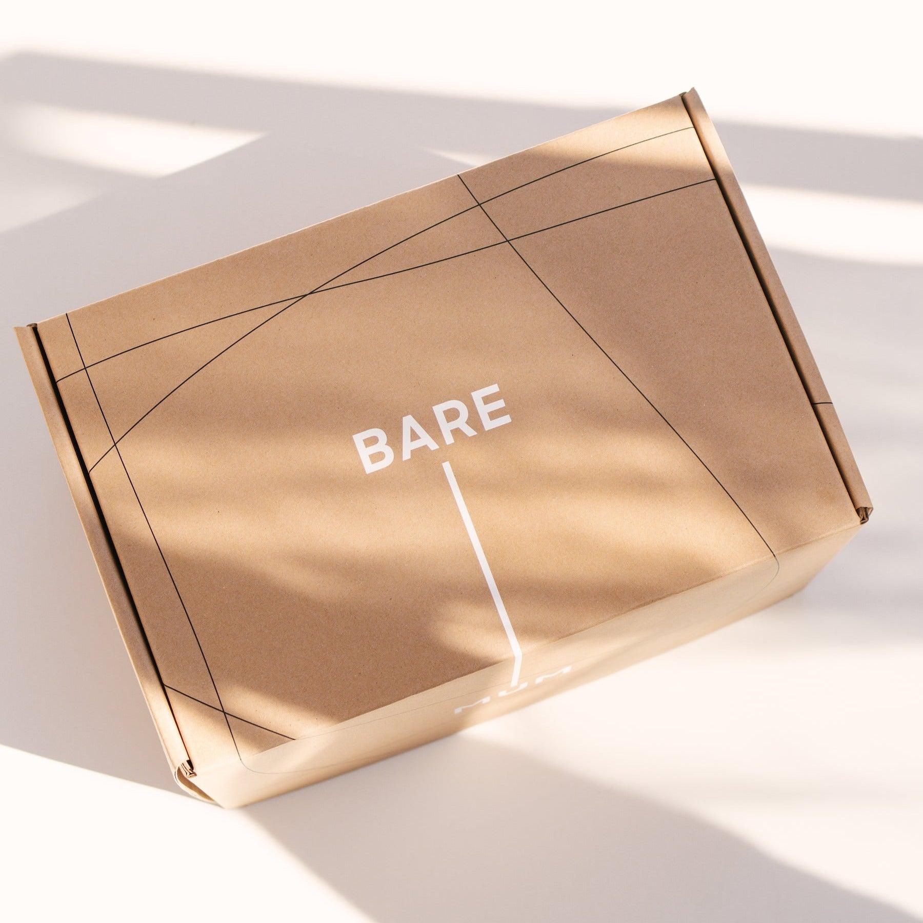 A brown box labeled Bare Mum's Postpartum Recovery Care Kit.