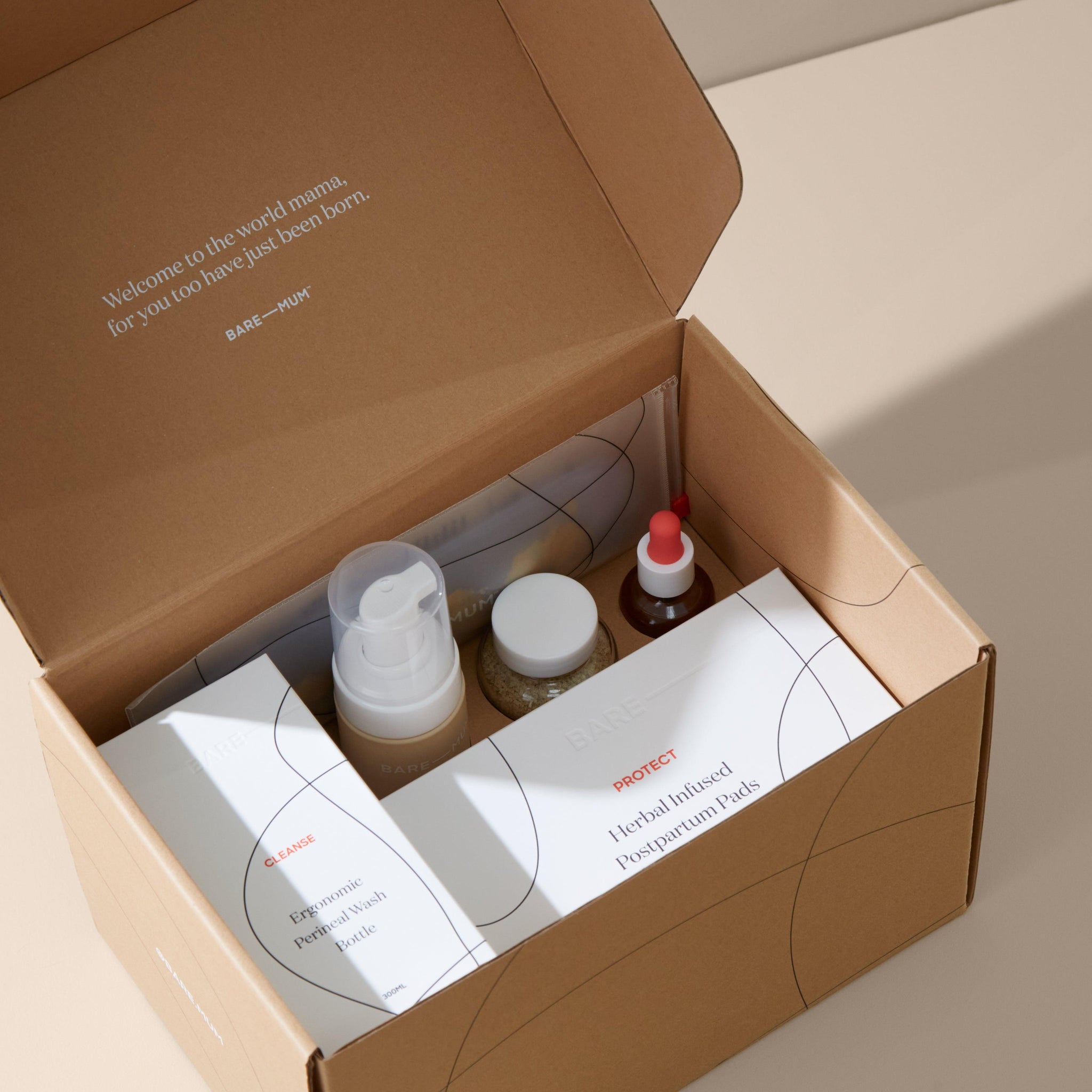 A Bare Mum Complete Recovery Care Kit packaged in a cardboard box for postpartum mothers.