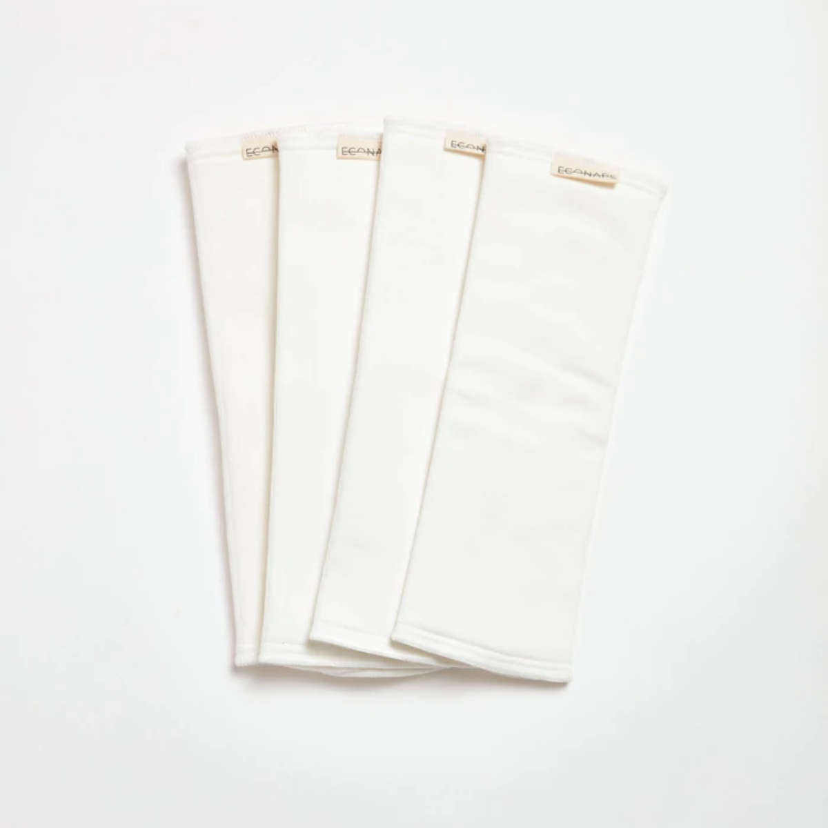 Four EcoNaps Bamboo Tri-Fold Night Booster Kits displayed on a white surface.