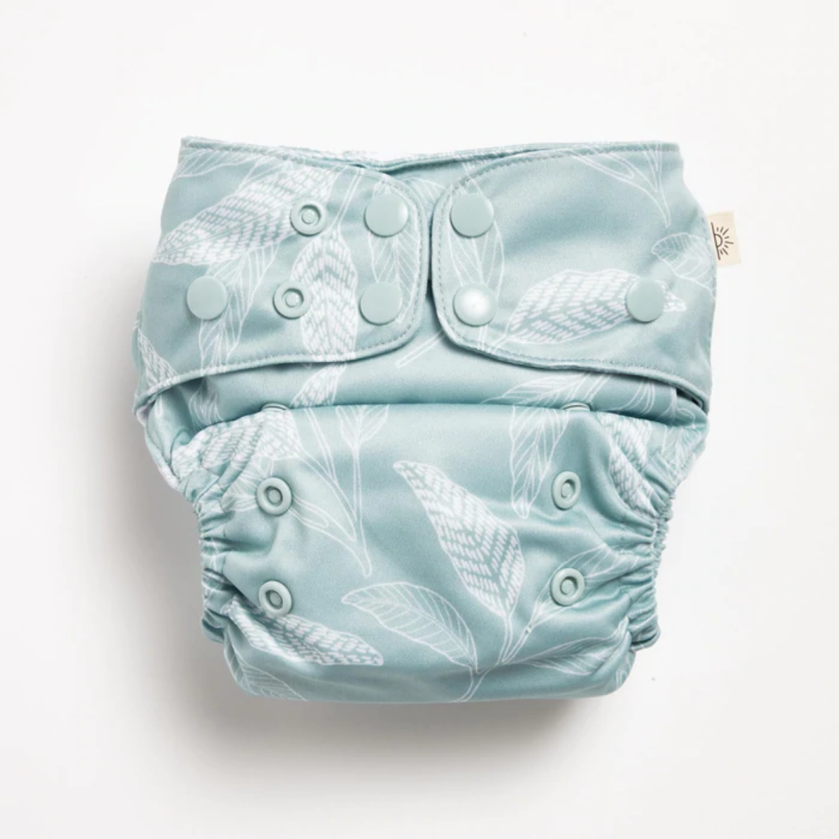An Ocean Native 2.0 Modern Cloth Nappy with white native prints on it by EcoNaps.