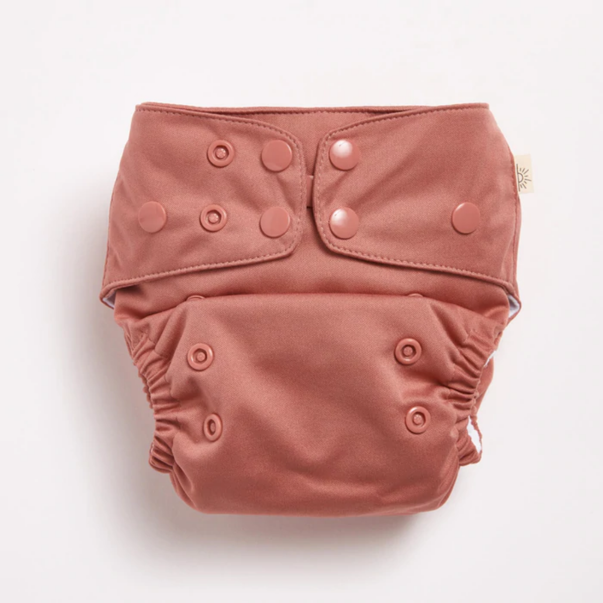A Terracotta 2.0 Modern Cloth Nappy by EcoNaps on a white surface.