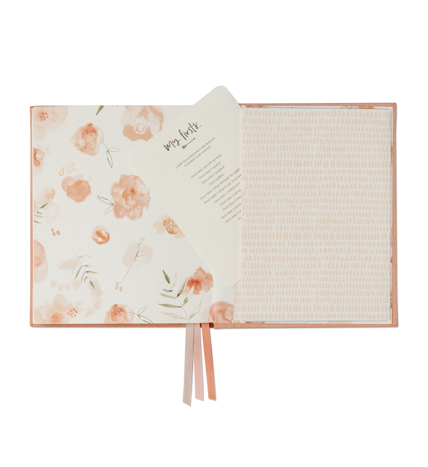 Open pages of the Emma Kate Co. little dreamer baby journal in petal on a transparent surface.