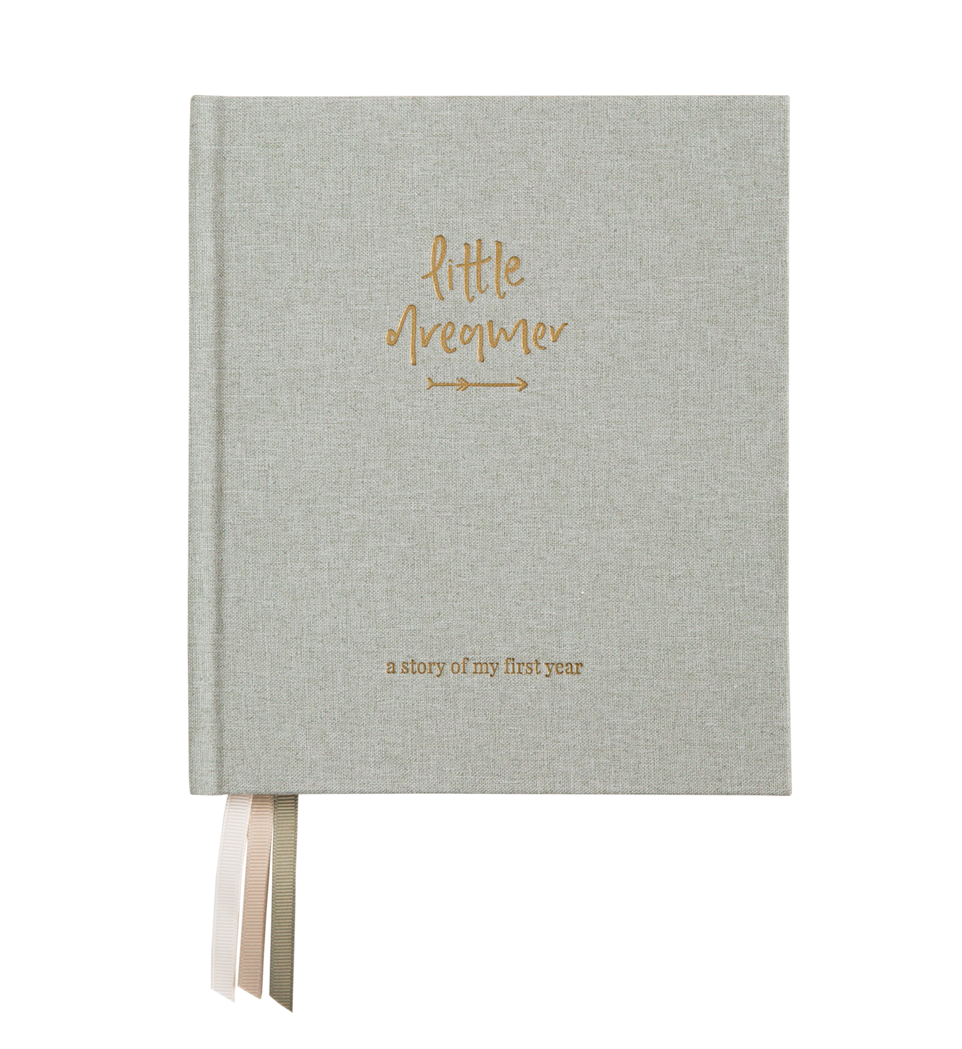 An Emma Kate Co. little dreamer baby journal in sage on a transparent surface.