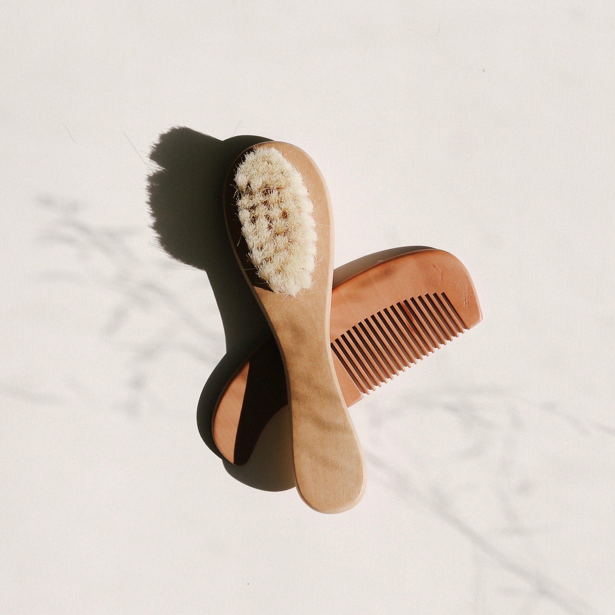 Our gorgeous Hair Brush & Comb Set is super soft. Perfect for your baby's delicate crown. Both the brush and comb have curved, wooden handles for easy and comfortable grip. 