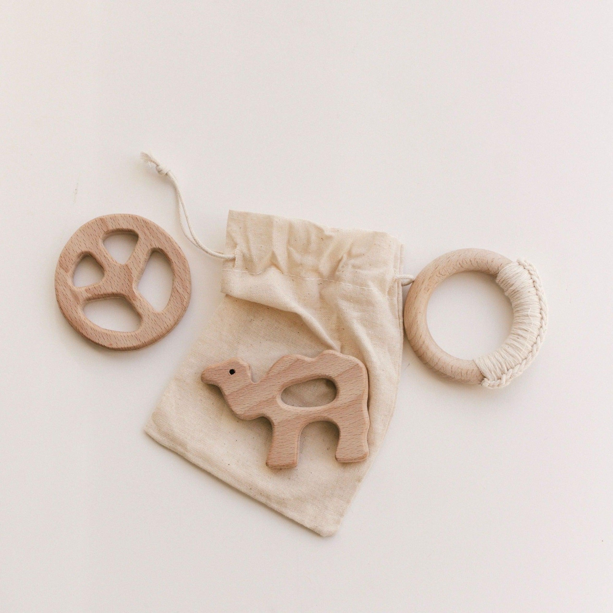 Our Natural Beech Wood Peace Teethers are 100% certified non-toxic and hand sanded to a smooth finish. Each teether is left unpolished, uncoated and untreated great for skin sensitivities and possible allergies.
