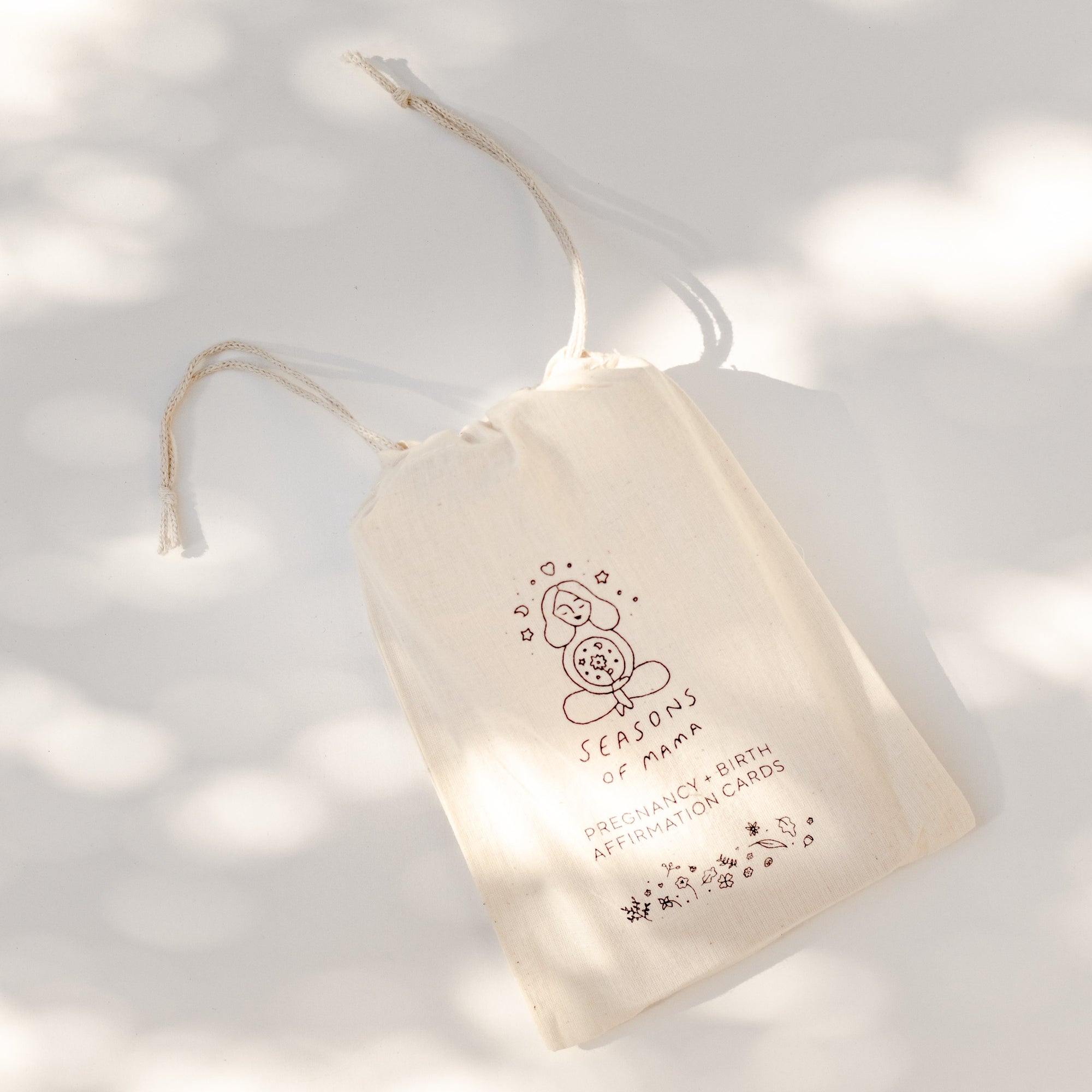 A Seasons of Mama branded calico bag.