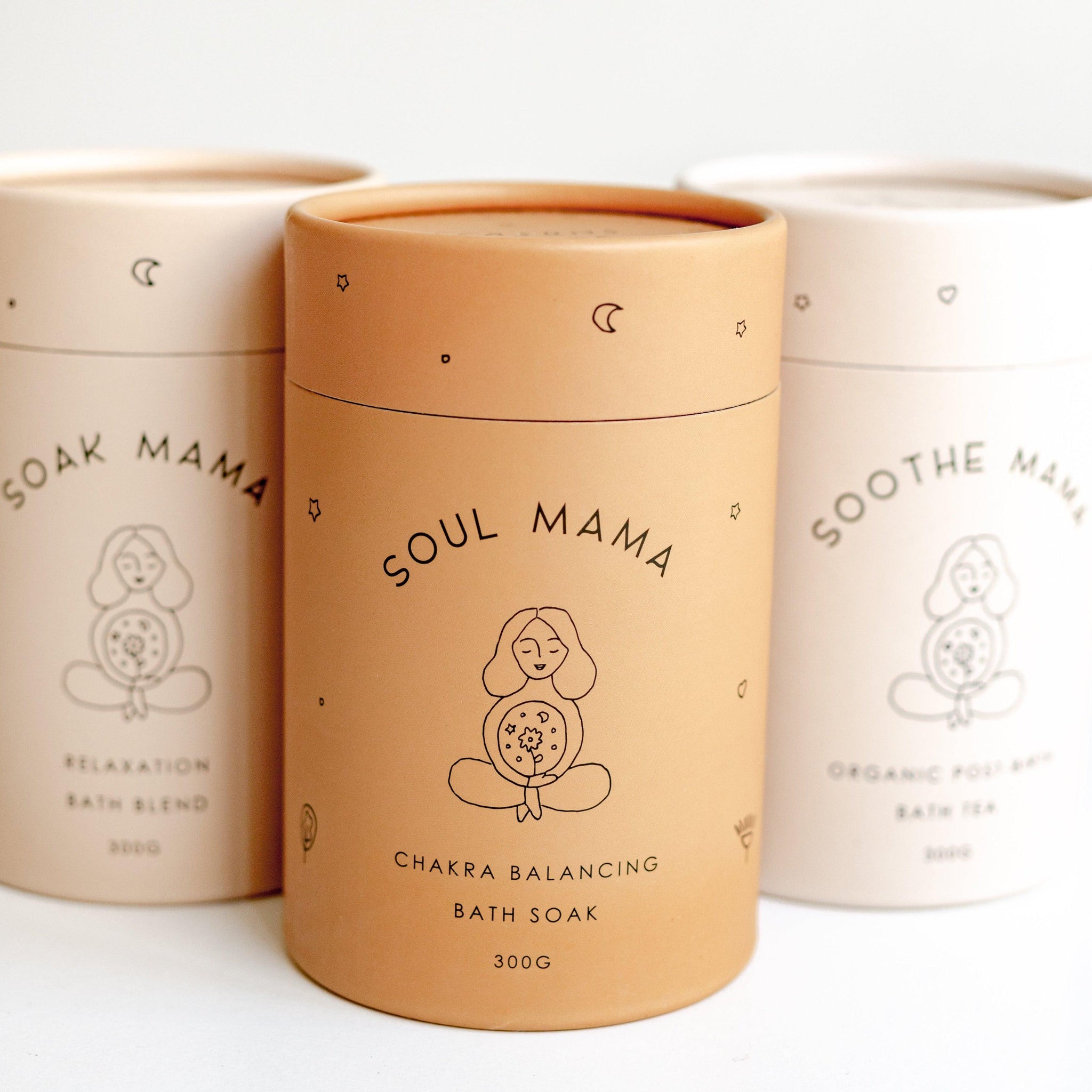 Three tins including Seasons of Mama's Soothe Mama Relaxation Bath Blend, Soul Mama Chakra Balancing Bath Soak and Soothe Mama Organic Post-Birth Bath Tea.