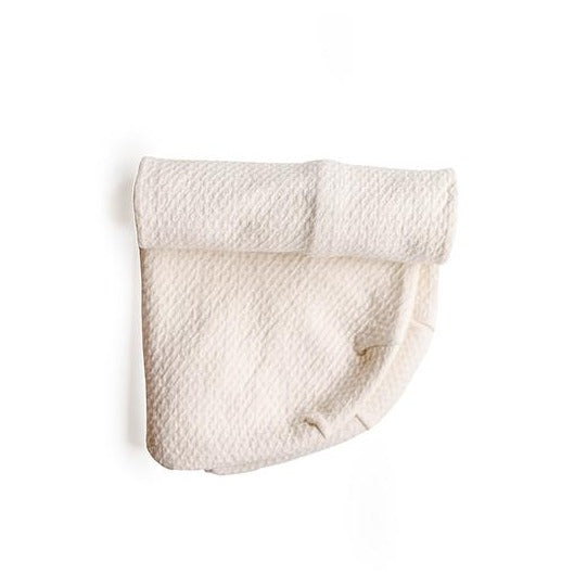 You asked for a fitted puddle pad and we did it! No more bunching or shifting.  Our new puddle pad works like a fitted sheet and stays in place.  Made with 100% organic cotton.  Is NOT waterproof (waterproof means non-breathable) but is a highly absorbent material to absorb small baby leaks.
