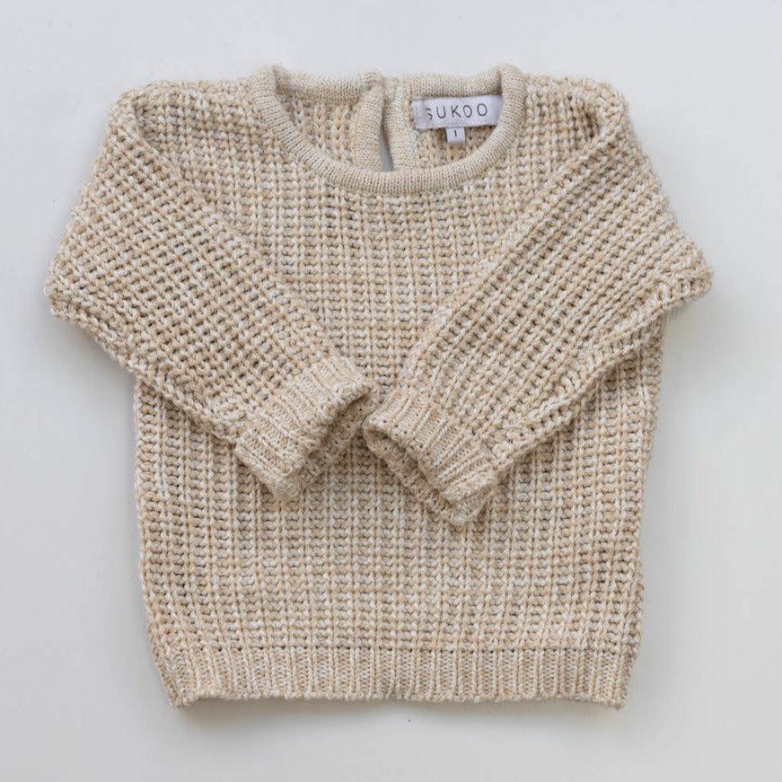 The Zoa knit is lovingly handmade using a loom which is a tool that is guided by the hand. 100% soft cotton, teardrop fastening at back with wood button. Good amount of stretch, considered true to size described as more ‘fitted’.