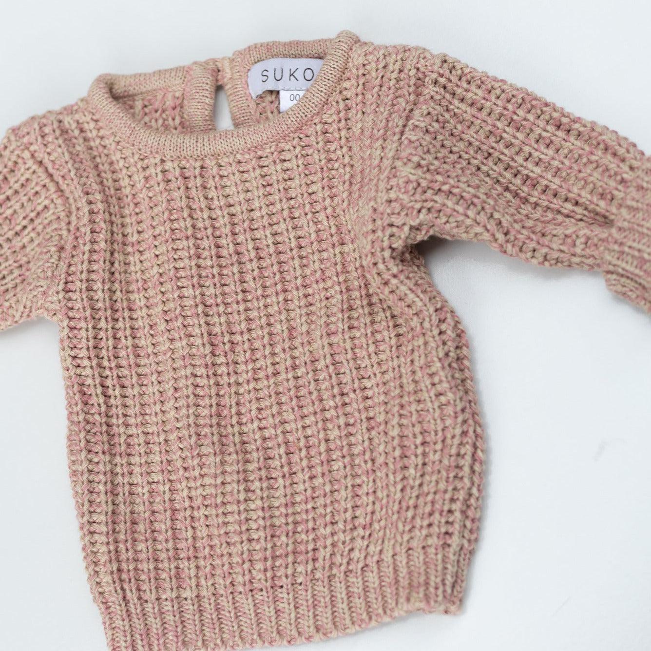 The Zoa knit is lovingly handmade using a loom which is a tool that is guided by the hand. 100% soft cotton, teardrop fastening at back with wood button. Good amount of stretch, considered true to size described as more ‘fitted’.